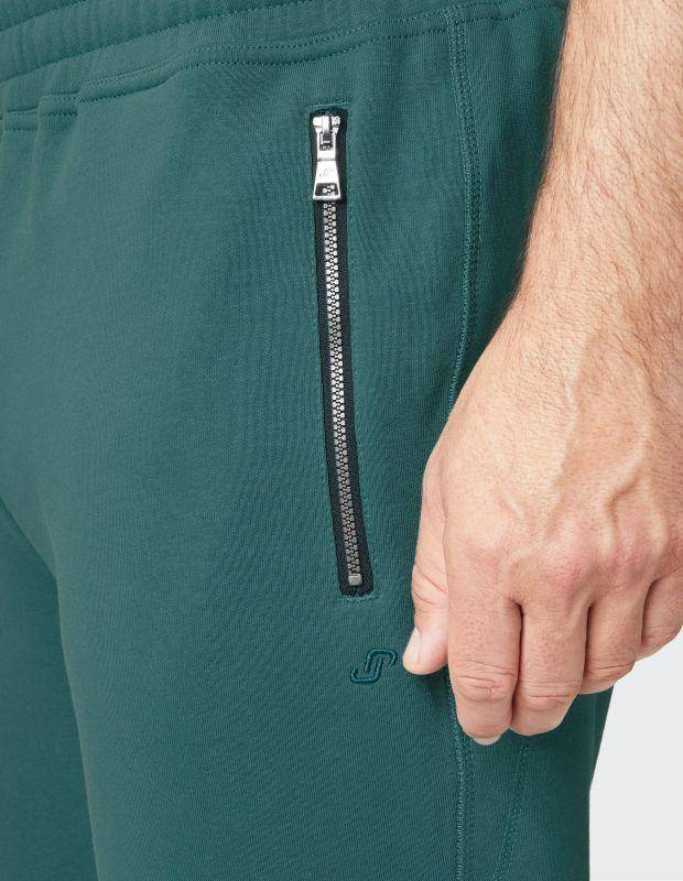 Joy Sportswear Freizeithose MAX Wärmende Hose mit modischem Zipper Auslauf
