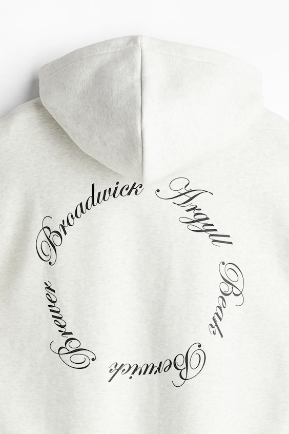 HM Bedruckter Hoodie in Oversized Fit Saisonschlussverkauf