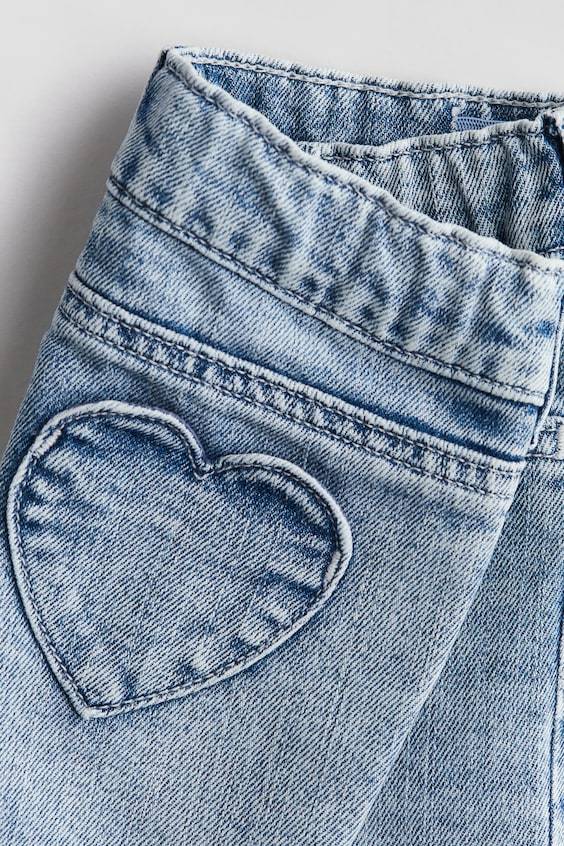 HM Jeans mit herzförmigen Taschen Rabatt