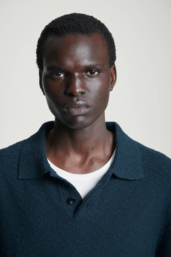 HM LANGÄRMLIGES BOUCLÉ-POLOSHIRT Bestseller